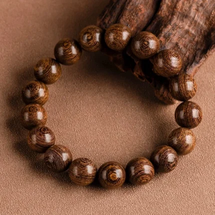 Gold sandalwood head ethnic bracelet